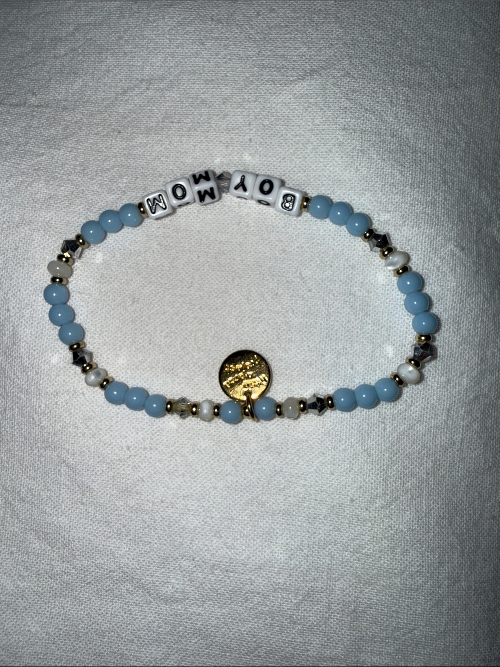 Little words project 
Mom Beaded Stretch Bracelet in Light Blue and Gold